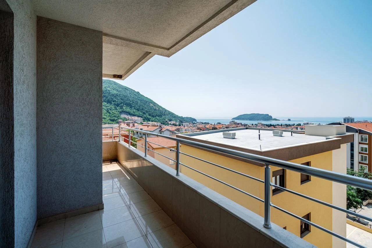 Spacious Two-bedroom Apartment with Sea View and Garage Space in Budva