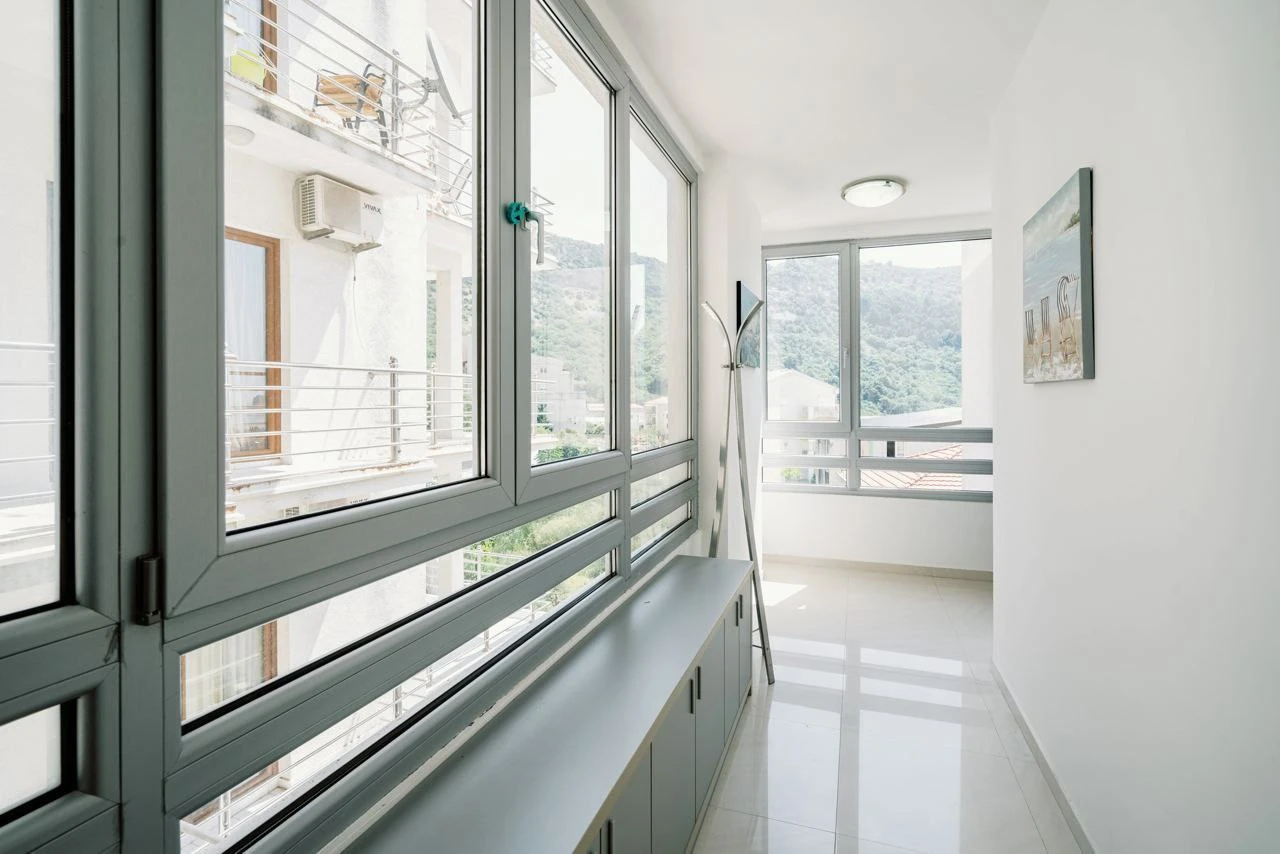 Spacious Two-bedroom Apartment with Sea View and Garage Space in Budva