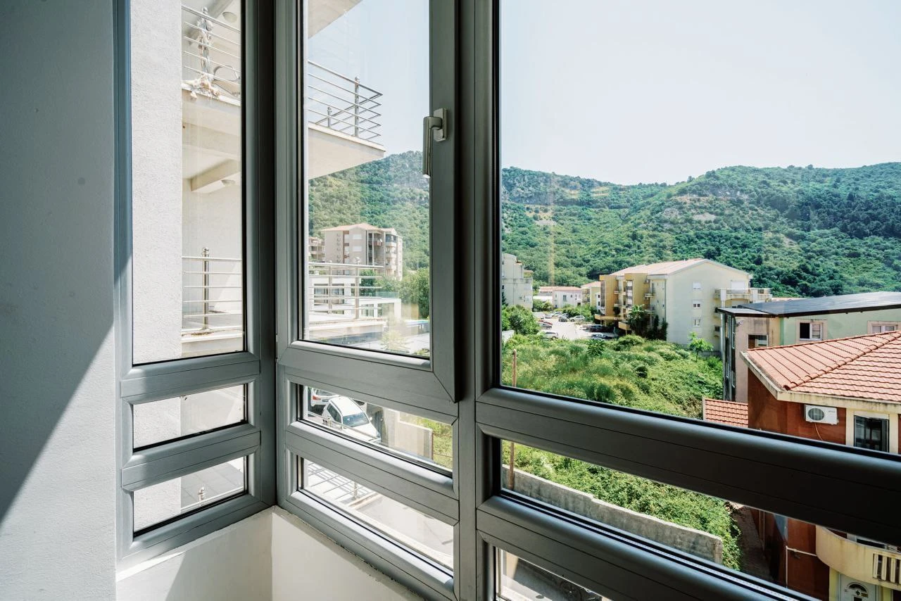 Spacious Two-bedroom Apartment with Sea View and Garage Space in Budva