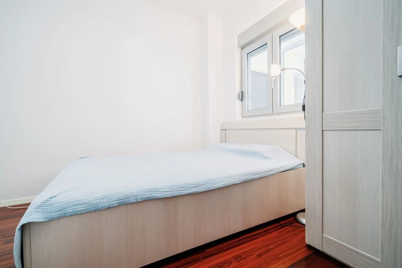 Spacious Two-bedroom Apartment with Sea View and Garage Space in Budva