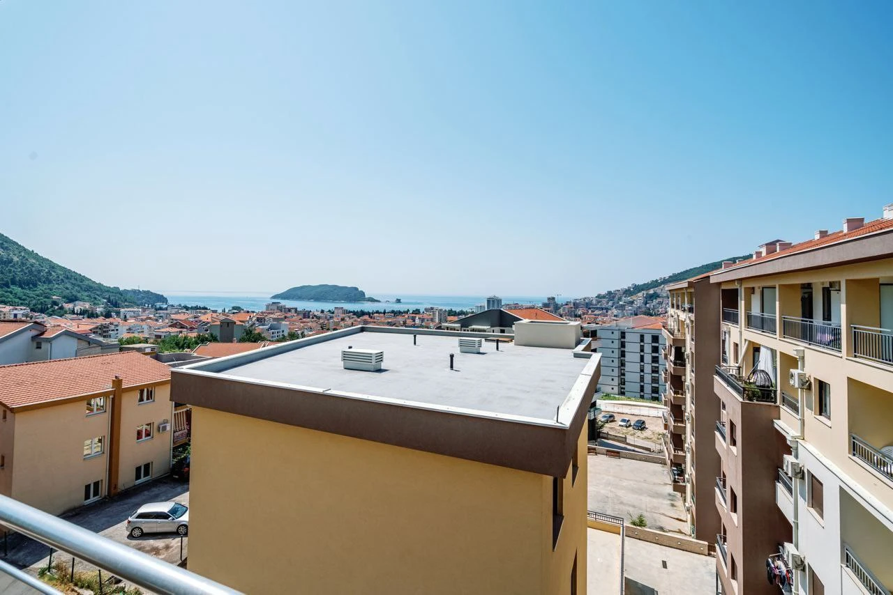 Spacious Two-bedroom Apartment with Sea View and Garage Space in Budva