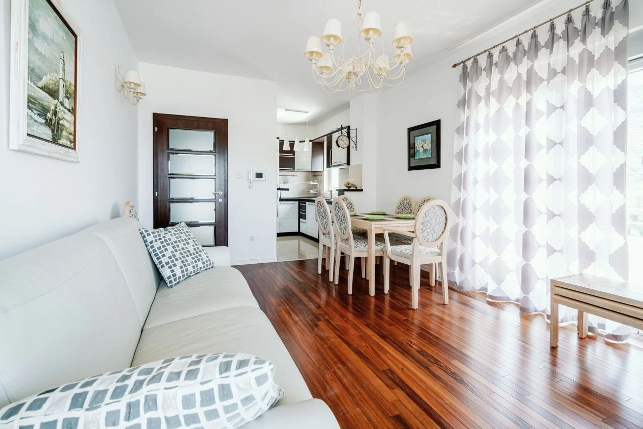 Spacious Two-bedroom Apartment with Sea View and Garage Space in Budva